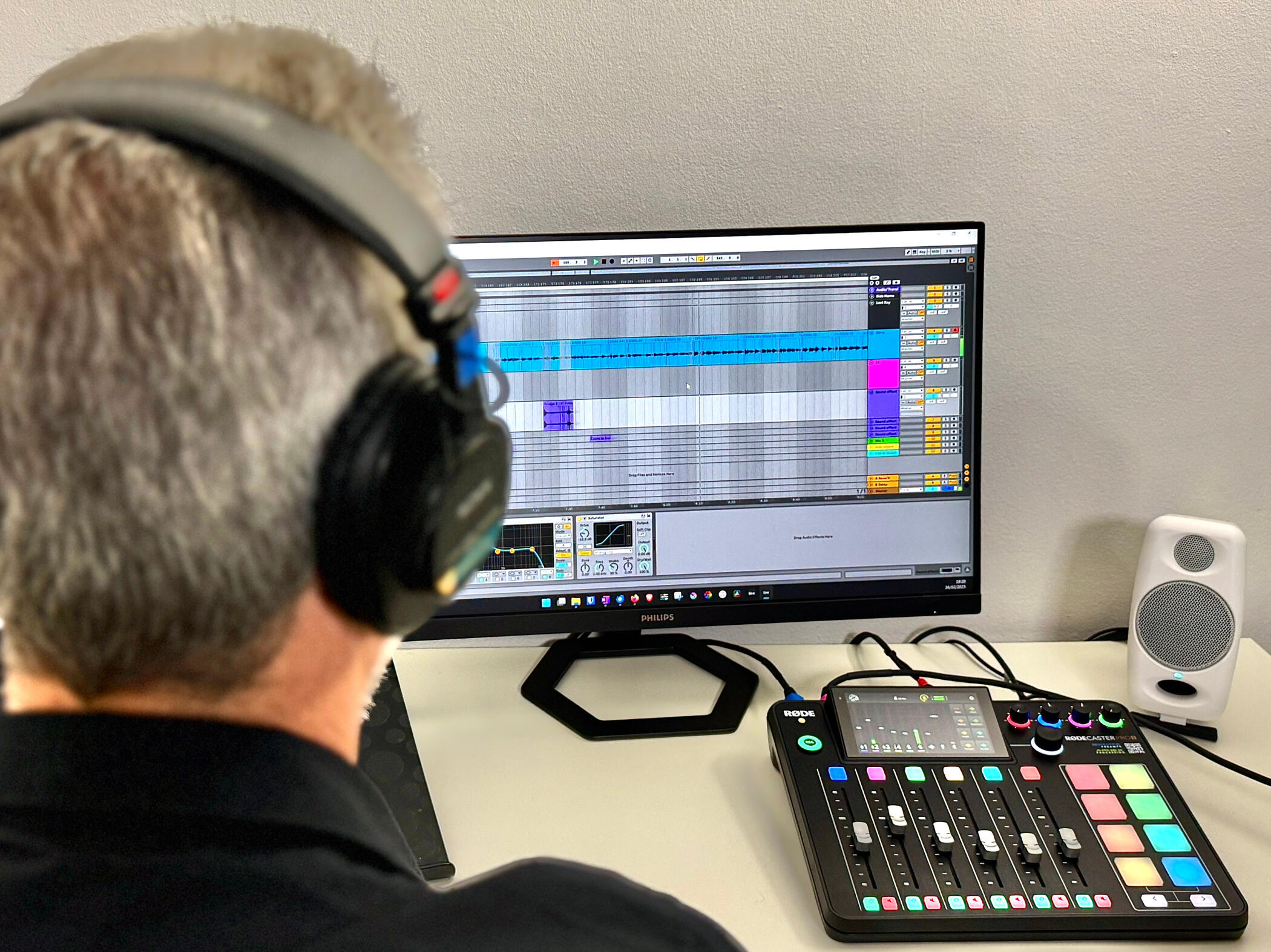 Podcasts Services Image of sound engineer working on audio file